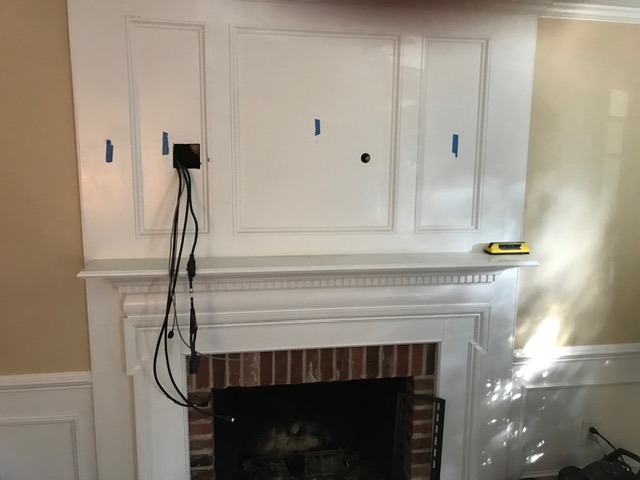TV mount pre-installation above brick fireplace with cable routing in NJ
