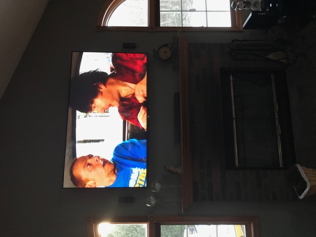 TV mounted high in two-story great room with vaulted ceiling in South Jersey